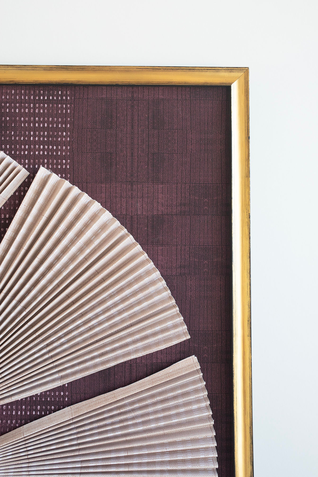 Blush pleated fans with feather detail