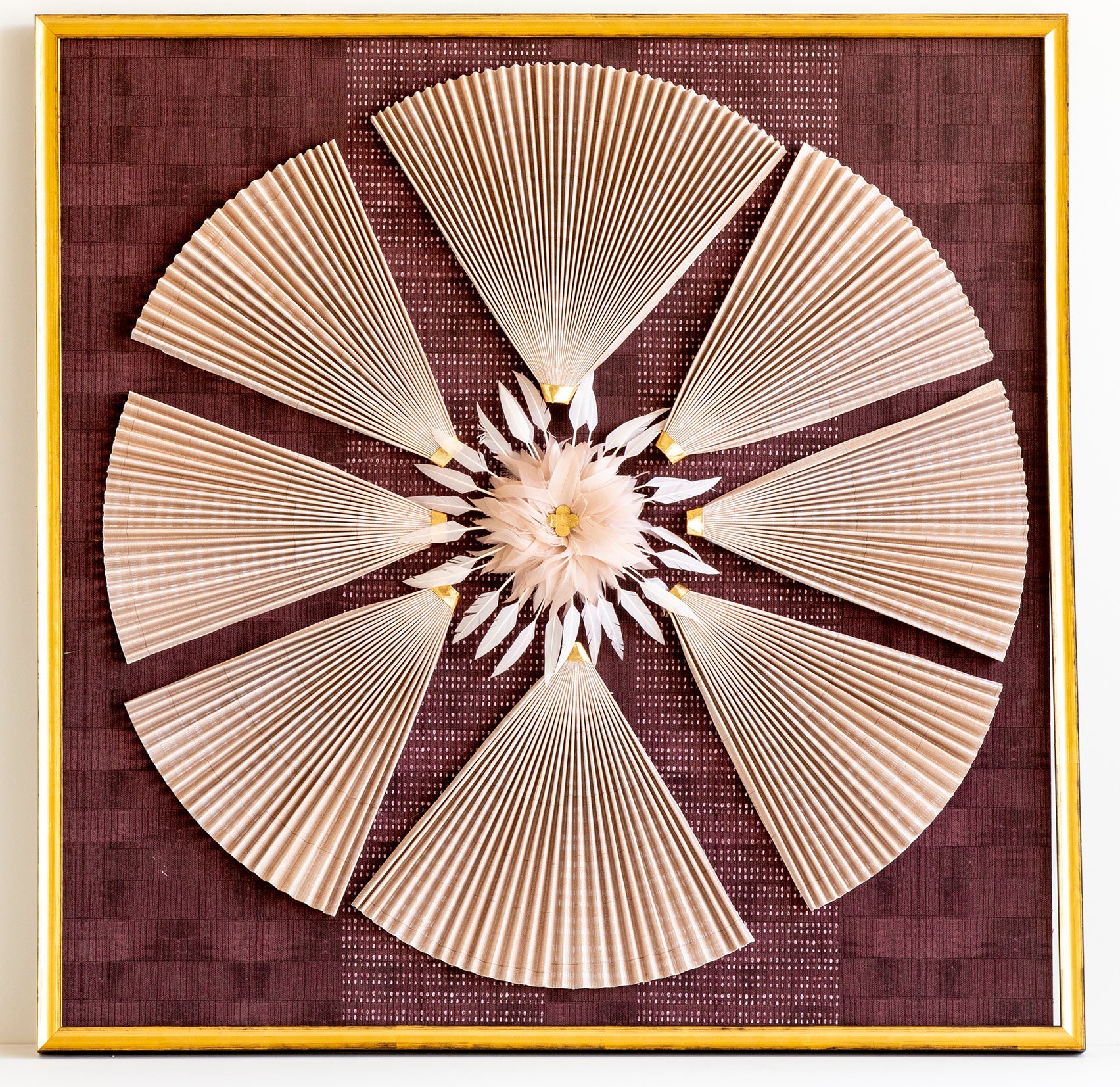 Blush pleated fans with feather detail